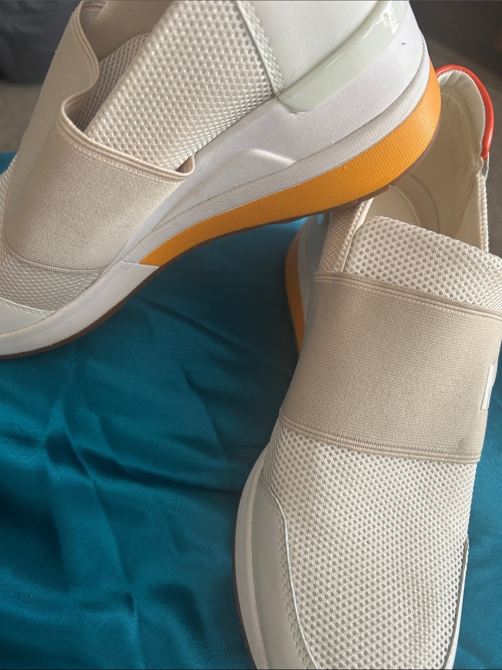 Michael Kors Slip-On Athletic Sneakers in Cream with Orange Accent